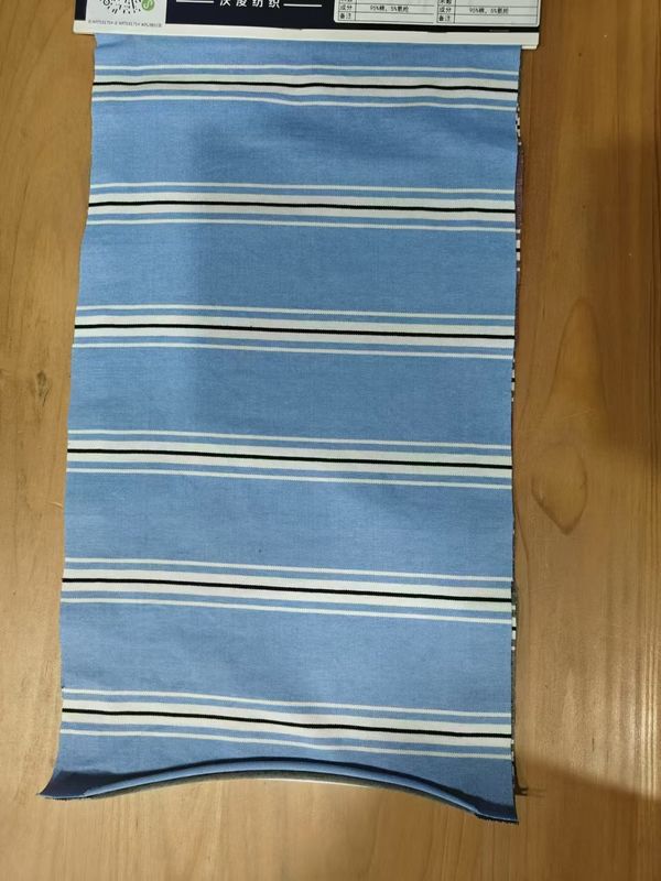 Stoffa di materiale a strisce confortevole, respirabile e che assorbe il sudore, per magliette