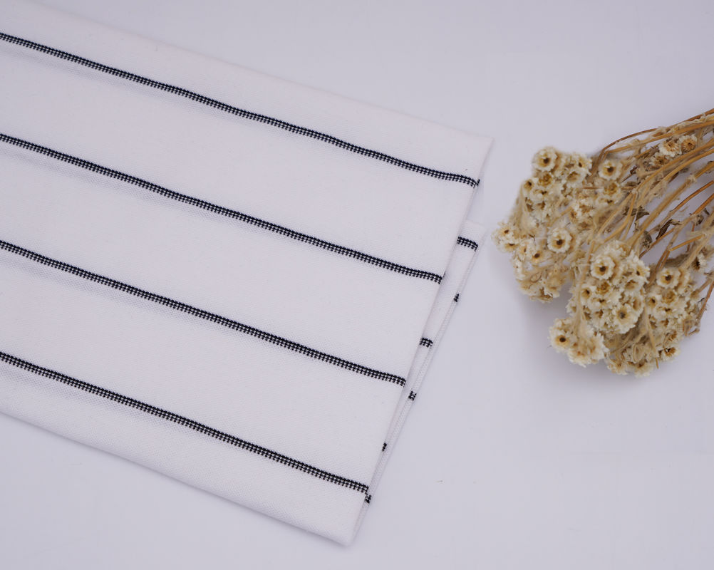 Comodo e traspirante e ecologico e naturale tessuto a maglia a righe per polo