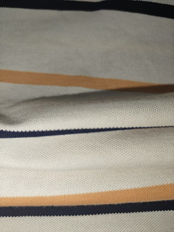 Materiale resistente all'usura e confortevole, antirughe e rinfrescante, a strisce per polo.