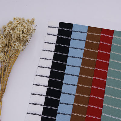 Un buon prezzo. Il filato molle assorbente sudato del tessuto 40S Lycra del piquè del cotone ha tinto il materiale della maglietta in linea